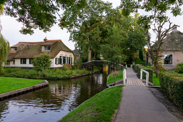 Fototapeta na wymiar Giethoorn Netherlands Venice of the North old house in the village center along the canals