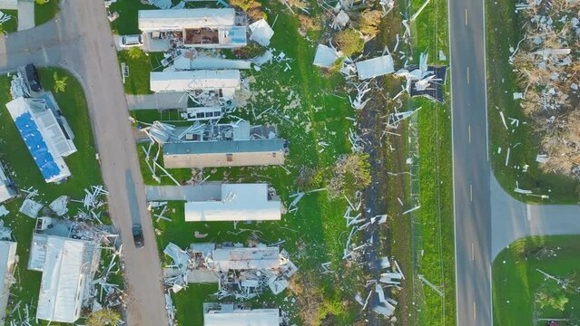 Hurricane Ian destroyed homes in Florida residential area. Natural disaster and its consequences
