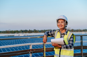 Young inspecotor female checking operation photovoltaic solar panel