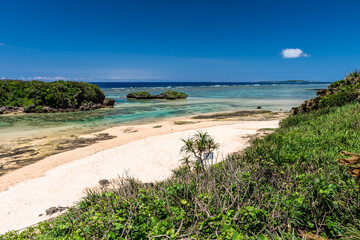 Amazing crystal clear turquoise sea at Hoshizuna beach in a tropical island of Japan.