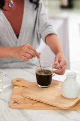 Woman drinking coffee in the morning