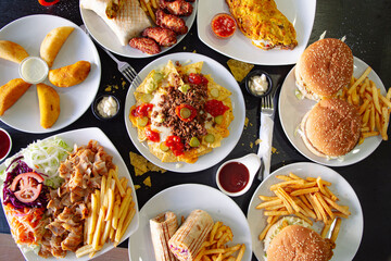 Top angle of various plates of different types of food