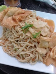a photo of noodle food, spicy and delicious