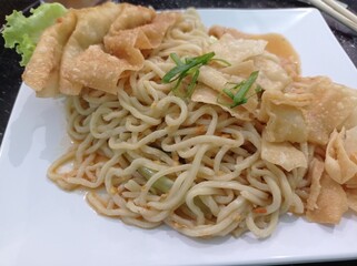 a photo of noodle food, spicy and delicious