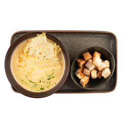 Portion of cheese soup with croutons