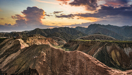 Obraz premium Mesmerizing sunset light over the Dangxia Landforms, between the Gobi Desert and the Qilian Mountains. Gansu Province. China