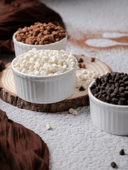 CHOCOLATE HEAVEN:
All three different types of chocolates shown in a picture (dark chocolate, white chocolate and milk chocolate)
