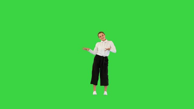 Beautiful caucasian girl in office stage costume appears, dances joyfully and walks away on a Green Screen, Chroma Key.