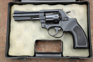 Vintage revolver in the case
