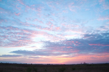 sky and clouds After sunset on the deserted meadow