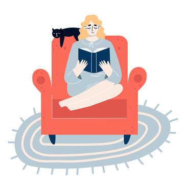 Young woman sitting on chair and reading book.