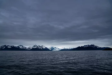 Foto op Canvas Panoramic views of glaciers under dramatic clouds in Kenai Fjords National Park © Tushar