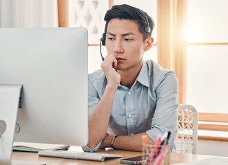 Consulting, thinking and call center with businessman at computer working on idea, telemarketing...