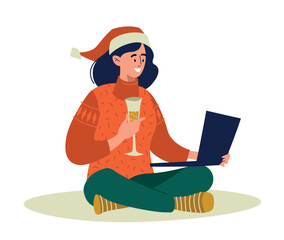 Online greetings for the new year. A girl in a santa claus hat and a glass of champagne sits on the floor with a laptop. Vector image.