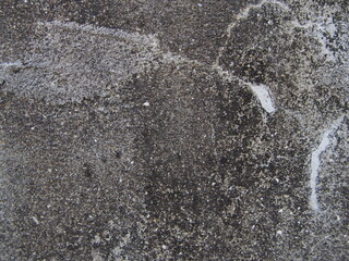 表面のひび割れた灰色のセメントのテクスチャー