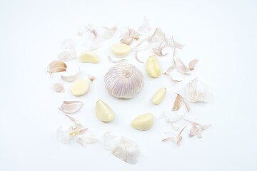 garlic and peel on white background isolate