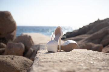 Wedding shoes on beach