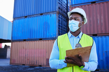 Logistics, shipping and businessman in covid with clipboard in cargo container yard. Construction...