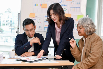 Asian businesswoman is counseling a financial investment for her business client