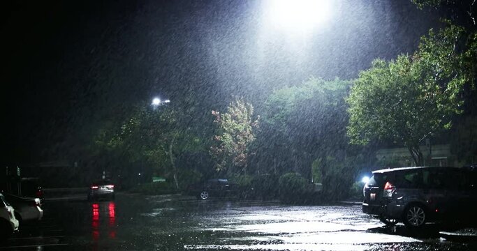 parking zone, night street under the heavy rain caused by tropical storm Ian on 09.30.2022 in Raleigh, NC, USA