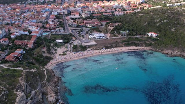 Aerial View Of Spiaggia Rena Bianca In Sardinia. Parallax Shot