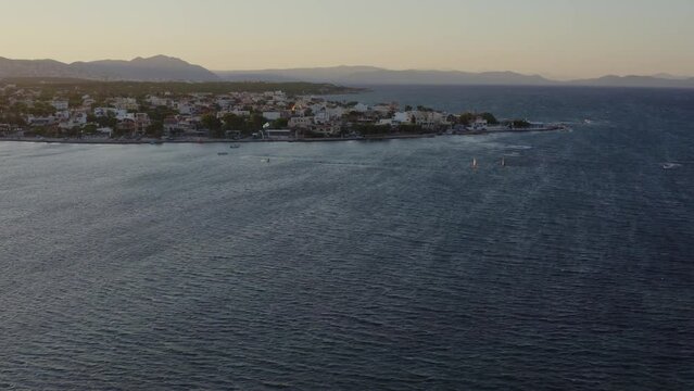 Aerial - General shot of water sports on a windy day in Artemida, Greece
