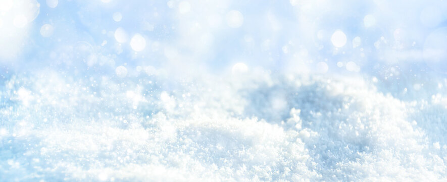 Christmas Winter Background With Blue Bokeh Light On Snow Landscape