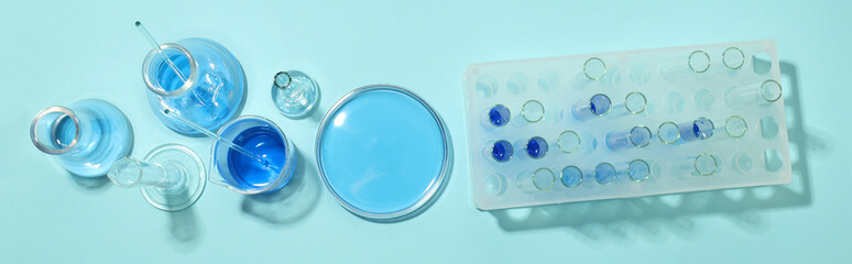 Concept of science and research with laboratory accessories, top view
