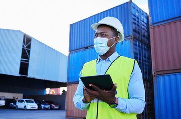 Man, logistics worker, and covid with a tablet to check inventory in mask with cargo container in...