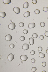 Abstract water drops on grey silver background, macro, Bubbles close up, Cosmetic liquid drops,...