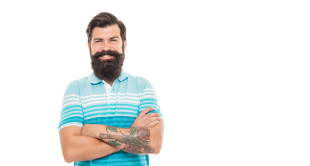Happy unshaven man keeping arms crossed. Confident man with beard smile. Bearded man, copy space