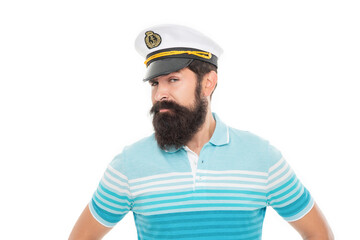 Bearded captain looking askance. Bearded man portrait. Bearded man wearing sailor cap