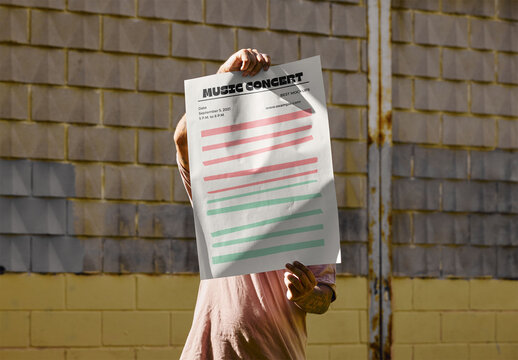 Man Holding A2 Poster Mockup