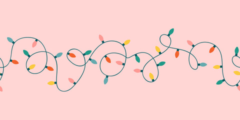 Christmas lights garland seamless border. Holiday LED bulb strand for magic festive prints. Flat illustration for greeting cards and other graphic design. © Veronica