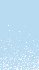 Fototapeta na wymiar Magic falling snow christmas background. Subtle flying snow flakes and stars on light blue winter backdrop. Magic falling snow holiday scenery. Vertical vector illustration.