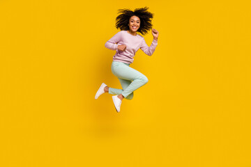 Fototapeta na wymiar Full size profile side photo of young pretty woman jump run rush motion isolated over yellow color background