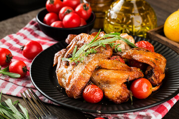 A plate of delicious roasted chicken wings