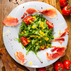Rocket salad with dried Spanish ham