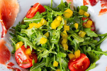 Rocket salad with dried Spanish ham
