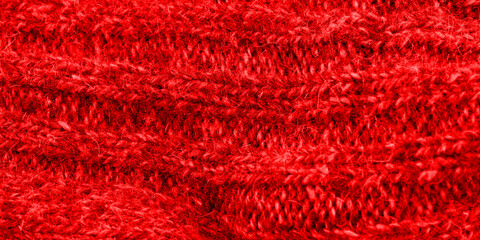 The texture of the red color of the fabric. Closeup