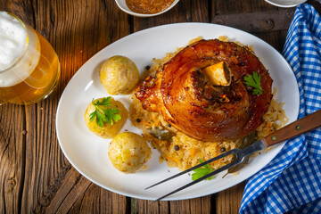 pork knuckle with sauerkraut and sweet mustard