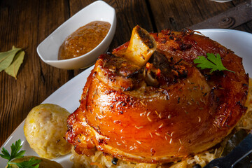 pork knuckle with sauerkraut and sweet mustard