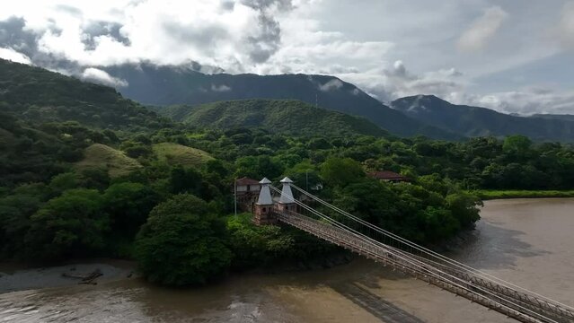Aerial View of Puente de Occidente and Cauca River, Bridge Pyramidal Towers and Landscape, Drone Shot