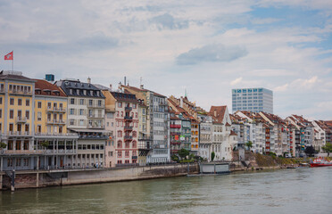 Buildings in the city centre of Basel and the Rhine river, Switzerland. Riverside of swiss city