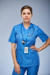 Woman nurse in medical suit isolated portrait.