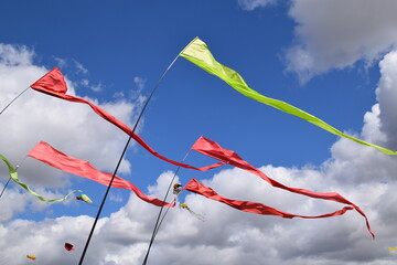 Brightly coloured flags on a windy day