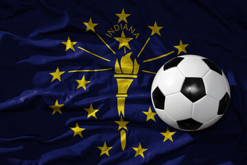 vintage football ball on the waveing indiana state flag background. 3D illustration