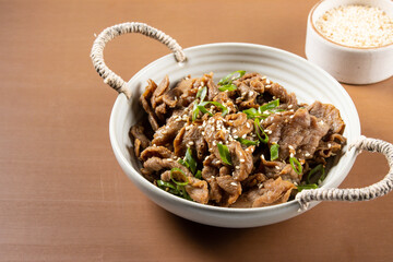 Bulgogi is Korean style grilled or roasted dish made from marinated slices of meat.