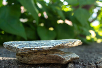 Stone podium or showcase. Presentation background for perfume and cosmetic products. Front view.
