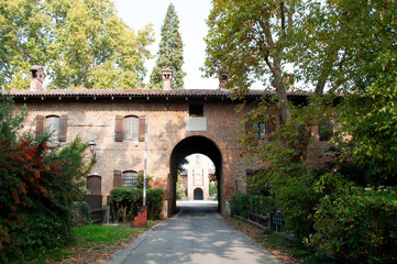 Fototapeta na wymiar Mirazzano Castle Road. Milano, Italy